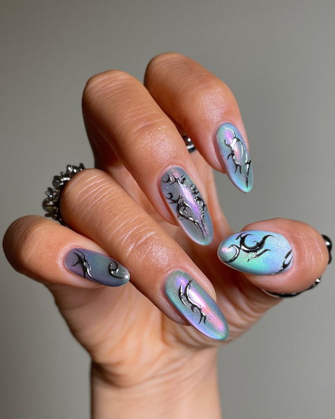 Close up of velvet pink and blue nails